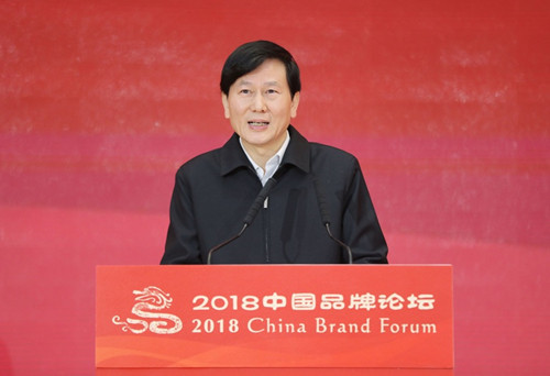 人民日报社总编辑庹震主持开幕式